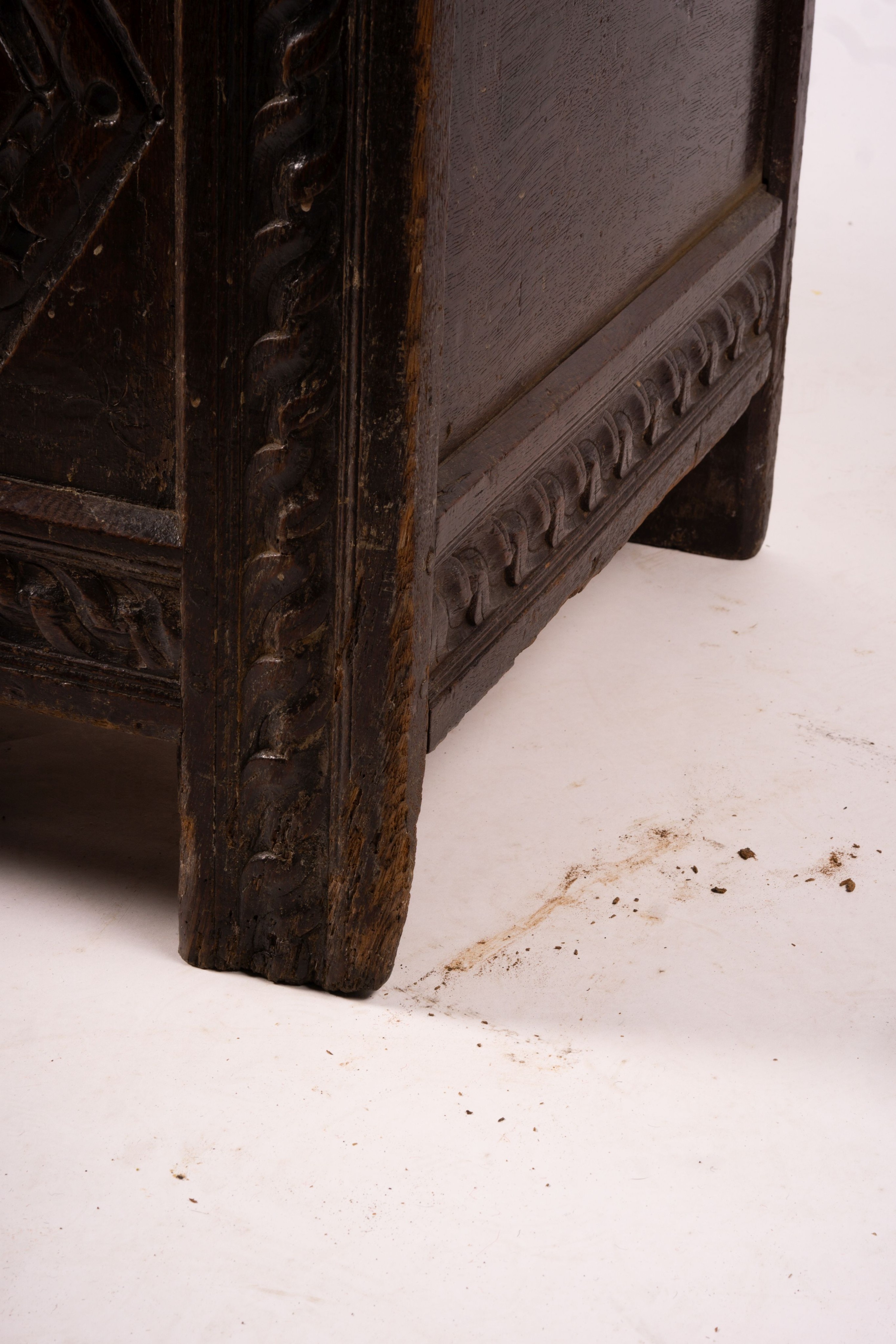 A 17th century carved panelled oak coffer, length 115cm, depth 56cm, height 67cm